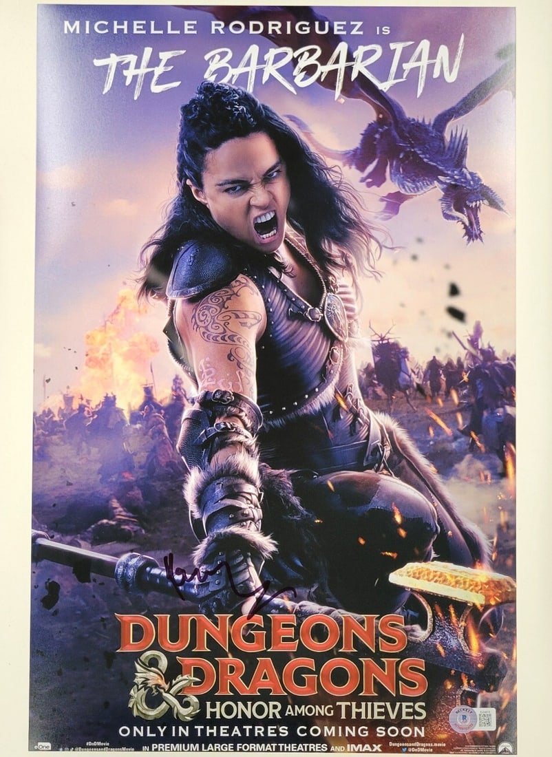 Michelle Rodriguez Autographed 11x17 Dungeons & Dragons Photo BAS Certified: Michelle Rodriguez Autographed 11x17 Dungeons & Dragons Photo BAS Certified This stunning 11x17 photograph is a must-have for fans of the action-packed movie "Dungeons & Dragons: Honor Among Thieves."