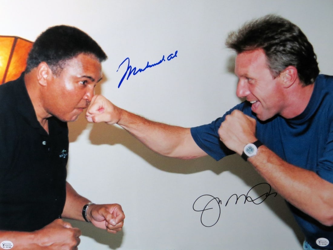 Muhammad Ali Joe Montana 16X20 Autographed Photo JSA Authenticated: Muhammad Ali Joe Montana 16X20 Autographed Photo JSA Authenticated This striking 16X20 photo captures the legendary Muhammad Ali and Joe Montana, both icons in their respective sports of boxing and fo