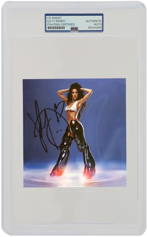 Katy Perry Signed 143 CD Insert Card PSA/DNA Encapsulated 6.5x10: Katy Perry Signed 143 CD Insert Card PSA/DNA Encapsulated 6.5x10 This Katy Perry signed 143 CD 5x5 insert card is a unique collectible for fans and memorabilia enthusiasts. The item is encapsulated by