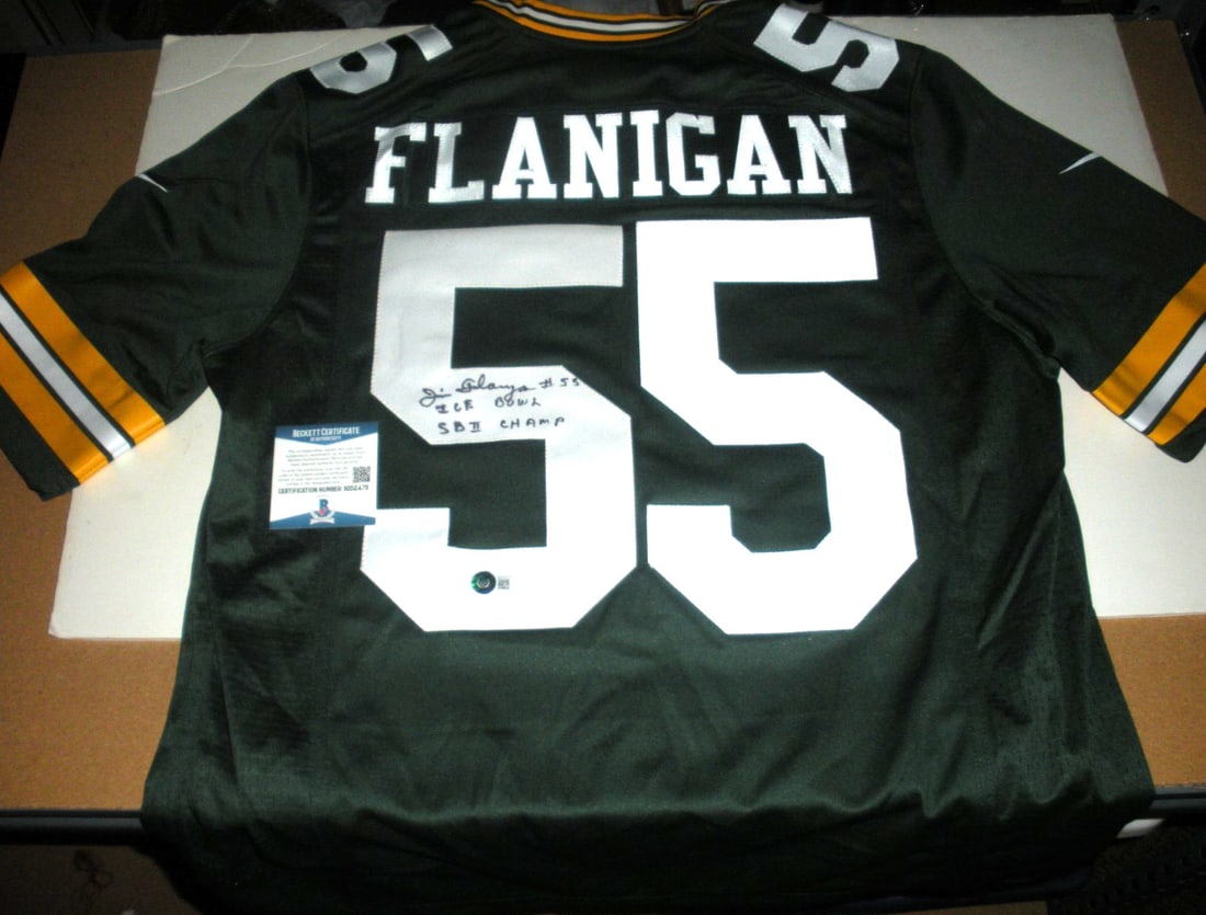 Jim Flanigan Signed Green Bay Packers Nike Jersey Beckett COA: Jim Flanigan Signed Green Bay Packers Nike Jersey Beckett COA This officially licensed Nike jersey features the signature of Jim Flanigan and is authenticated by Beckett Authentication Services (BAS).