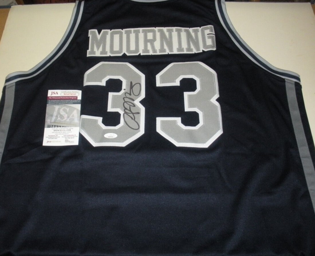 Alonzo Mourning Signed Georgetown Hoyas Jersey JSA COA Basketball: Alonzo Mourning Signed Georgetown Hoyas Jersey JSA COA Basketball Celebrate the legacy of Alonzo Mourning with this authentic Georgetown Hoyas and Miami signed jersey. This pre-owned basketball jersey