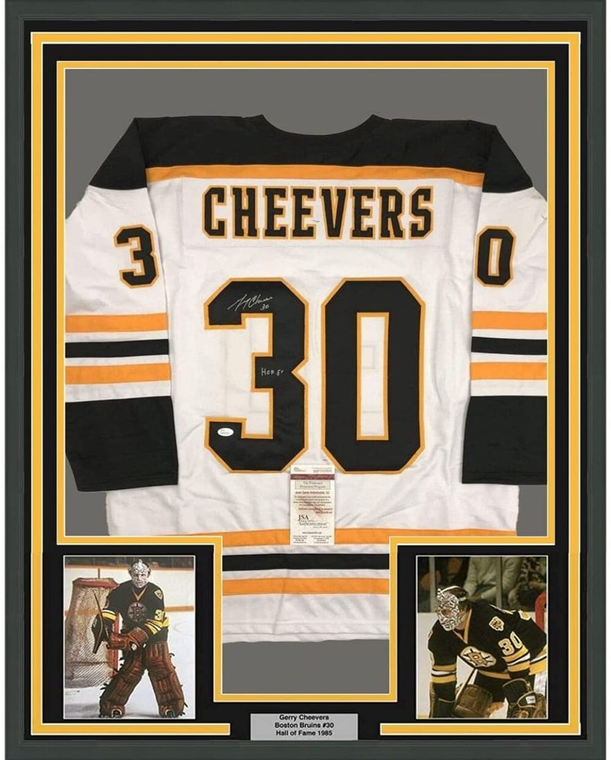 Framed Gerry Cheevers Autographed Jersey Boston Bruins JSA COA 33x42: Framed Gerry Cheevers Autographed Jersey Boston Bruins JSA COA 33x42 Celebrate hockey history with this professionally framed and autographed Gerry Cheevers jersey. The jersey features Cheevers' signa