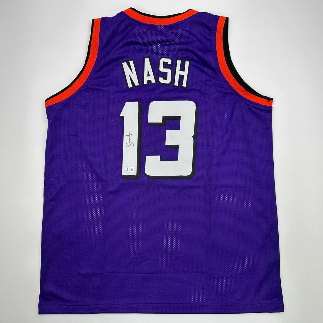 Steve Nash Autographed Purple Phoenix Suns Basketball Jersey Beckett COA: Steve Nash Autographed Purple Phoenix Suns Basketball Jersey Beckett COA Celebrate the legacy of NBA star Steve Nash with this autographed Phoenix Suns purple basketball jersey. This authentic jersey