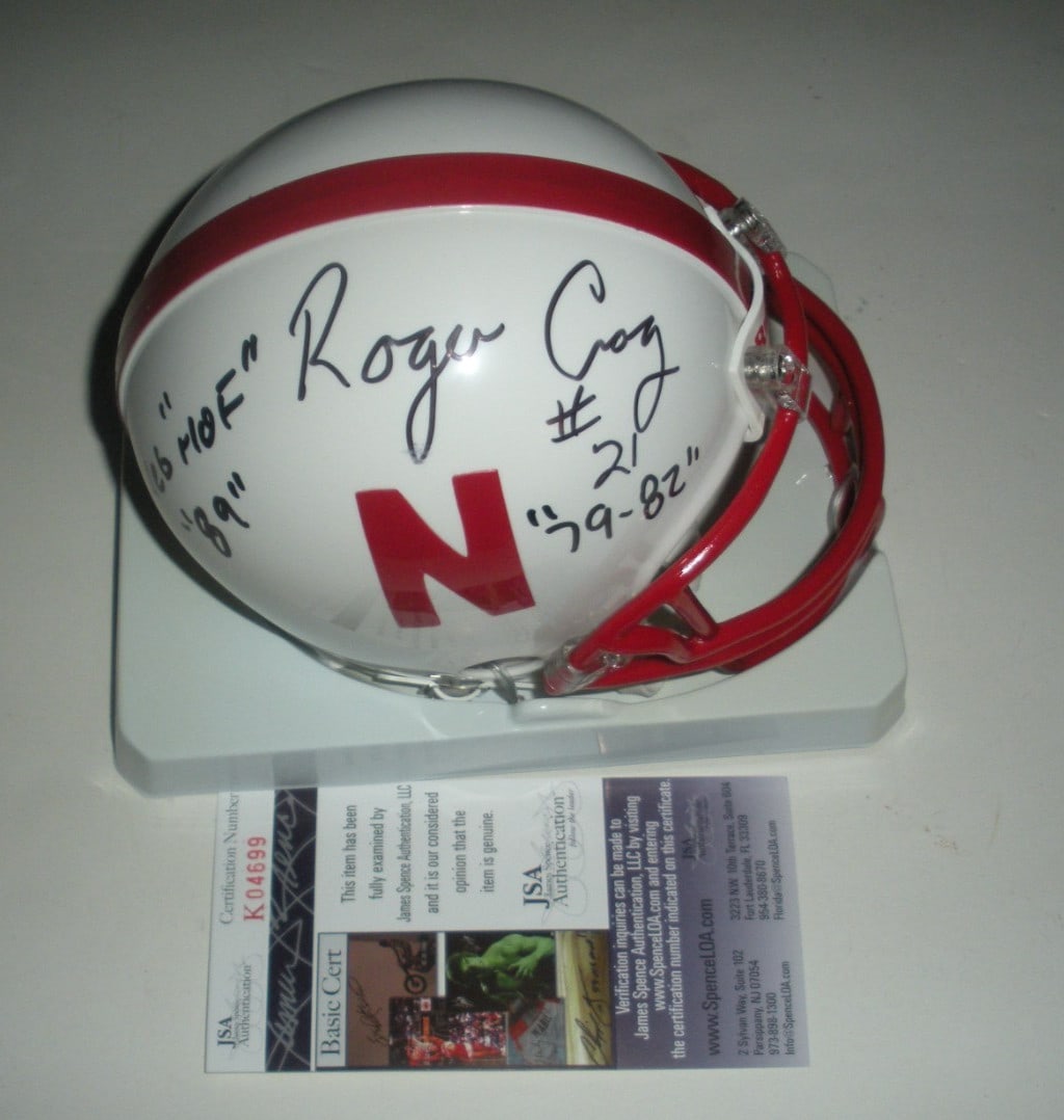 Roger Craig Nebraska Cornhuskers Signed Mini Helmet JSA COA: Roger Craig Nebraska Cornhuskers Signed Mini Helmet JSA COA This collectible mini helmet features the autograph of Roger Craig, a Hall of Famer known for his outstanding career with the Nebraska Cornh