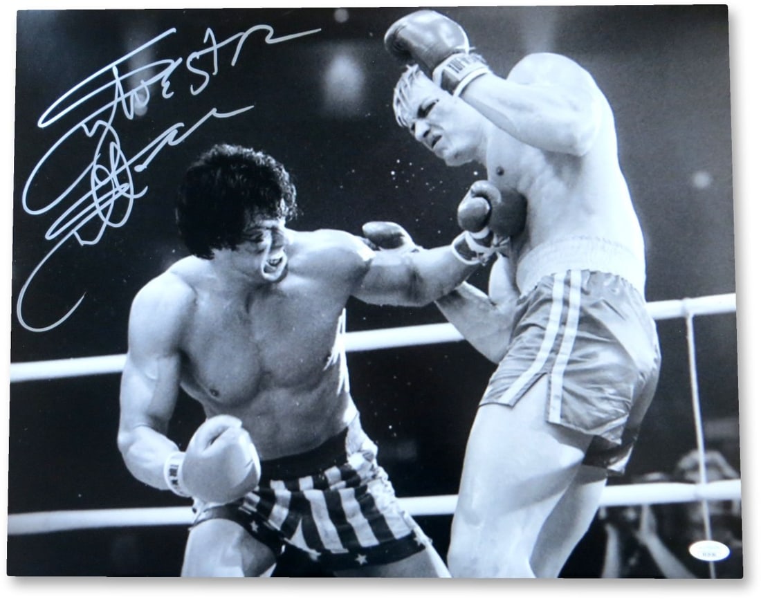 Sylvester Stallone Signed 16X20 Rocky IV Photo JSA Authenticated: Sylvester Stallone Signed 16X20 Rocky IV Photo JSA Authenticated This stunning 16x20 black and white photograph captures Sylvester Stallone in his iconic role from Rocky IV. Authentically signed by St