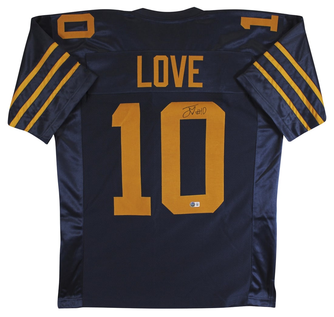 Autographed Jordan Love Navy Throwback Jersey Beckett Witnessed Authentication: Autographed Jordan Love Navy Throwback Jersey Beckett Witnessed Authentication This navy throwback pro style jersey has been personally signed by Jordan Love of the Green Bay Packers. The autograph is