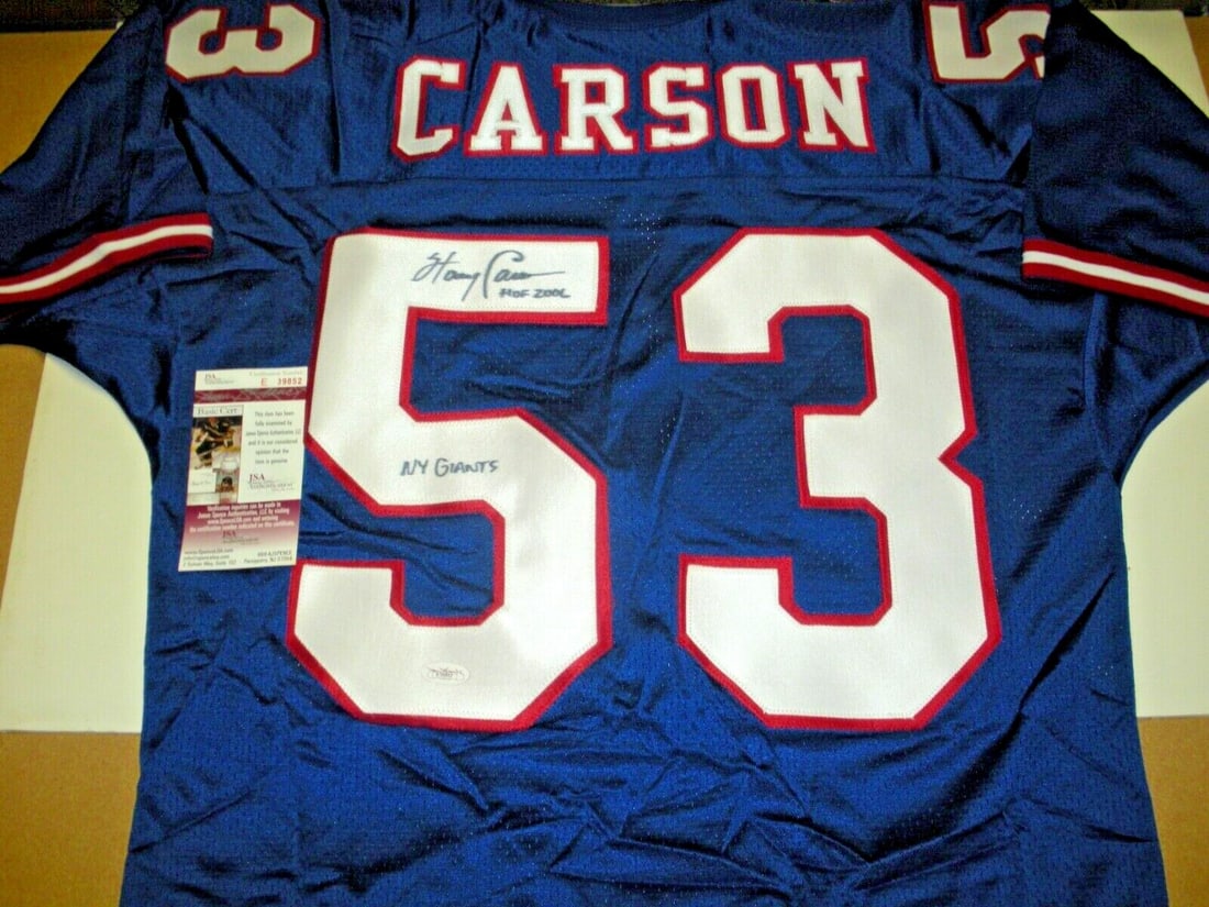 Signed Russell Football Jersey with JSA COA Harry Carson New York Giants: Signed Russell Football Jersey with JSA COA Harry Carson New York Giants This is a pre-owned, official licensed Russell jersey signed by Harry Carson of the New York Giants. The jersey is an original