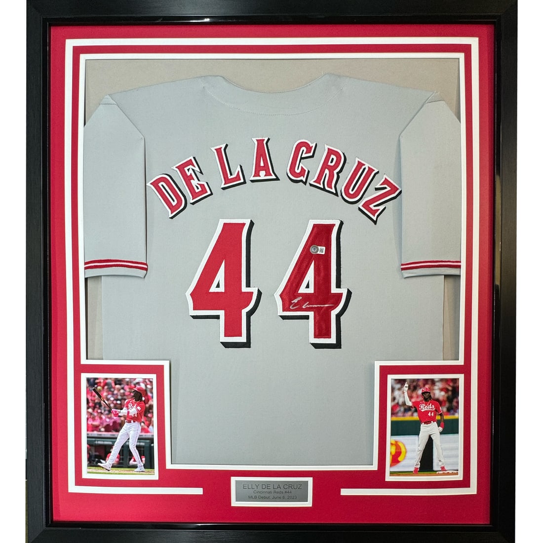 Framed Elly De La Cruz Autographed Jersey Cincinnati Reds BAS COA: Framed Elly De La Cruz Autographed Jersey Cincinnati Reds BAS COA This professionally framed autographed jersey features Elly De La Cruz of the Cincinnati Reds. The jersey is authentically signed and