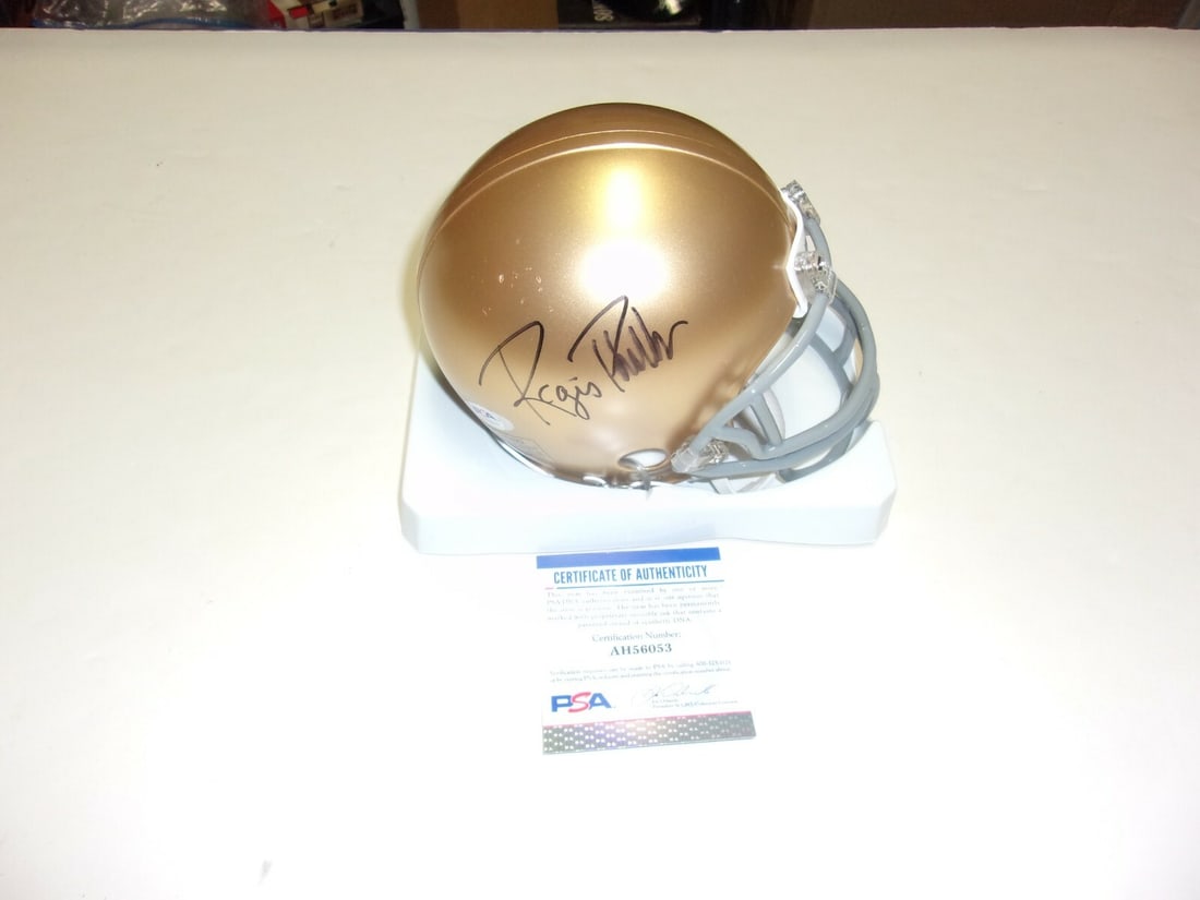 Regis Philbin Signed Notre Dame Mini Helmet PSA/DNA Authentic: Regis Philbin Signed Notre Dame Mini Helmet PSA/DNA Authentic This Notre Dame Fighting Irish mini helmet, signed by Regis Philbin, is a collectible piece for any sports memorabilia enthusiast. The