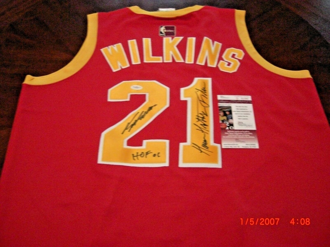 Dominique Wilkins Atlanta Hawks Signed Majestic Jersey JSA COA: Dominique Wilkins Atlanta Hawks Signed Majestic Jersey JSA COA This officially licensed Majestic jersey is signed by Dominique Wilkins, a legendary player for the Atlanta Hawks. It is a must-have for