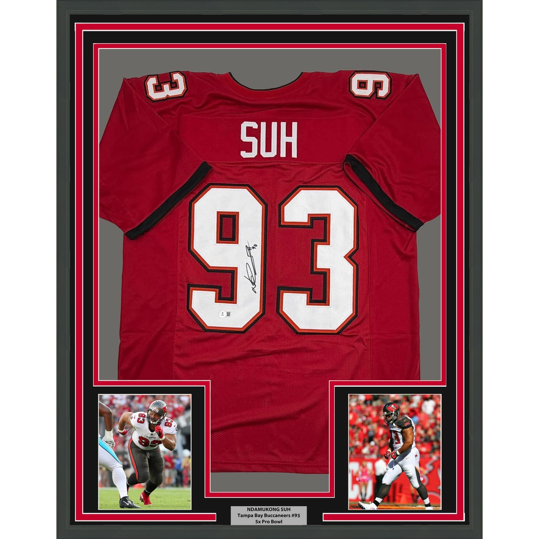 Ndamukong Suh Signed Tampa Bay Red Jersey Framed 35x39 Beckett Authenticated: Ndamukong Suh Signed Tampa Bay Red Jersey Framed 35x39 Beckett Authenticated This framed display features an autographed Ndamukong Suh Tampa Bay Buccaneers red jersey, authenticated by Beckett Grading