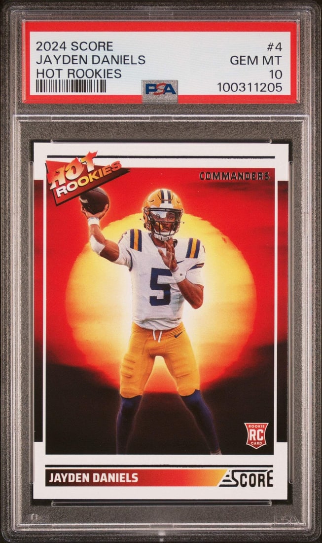 2024 Panini Score Jayden Daniels #4 RC Football Card PSA 10: 2024 Panini Score Jayden Daniels #4 RC Football Card PSA 10 This is a graded 2024 Panini Score Jayden Daniels #4 Hot Rookies RC Football Card, rated PSA 10. The card features athlete Jayden Daniels an