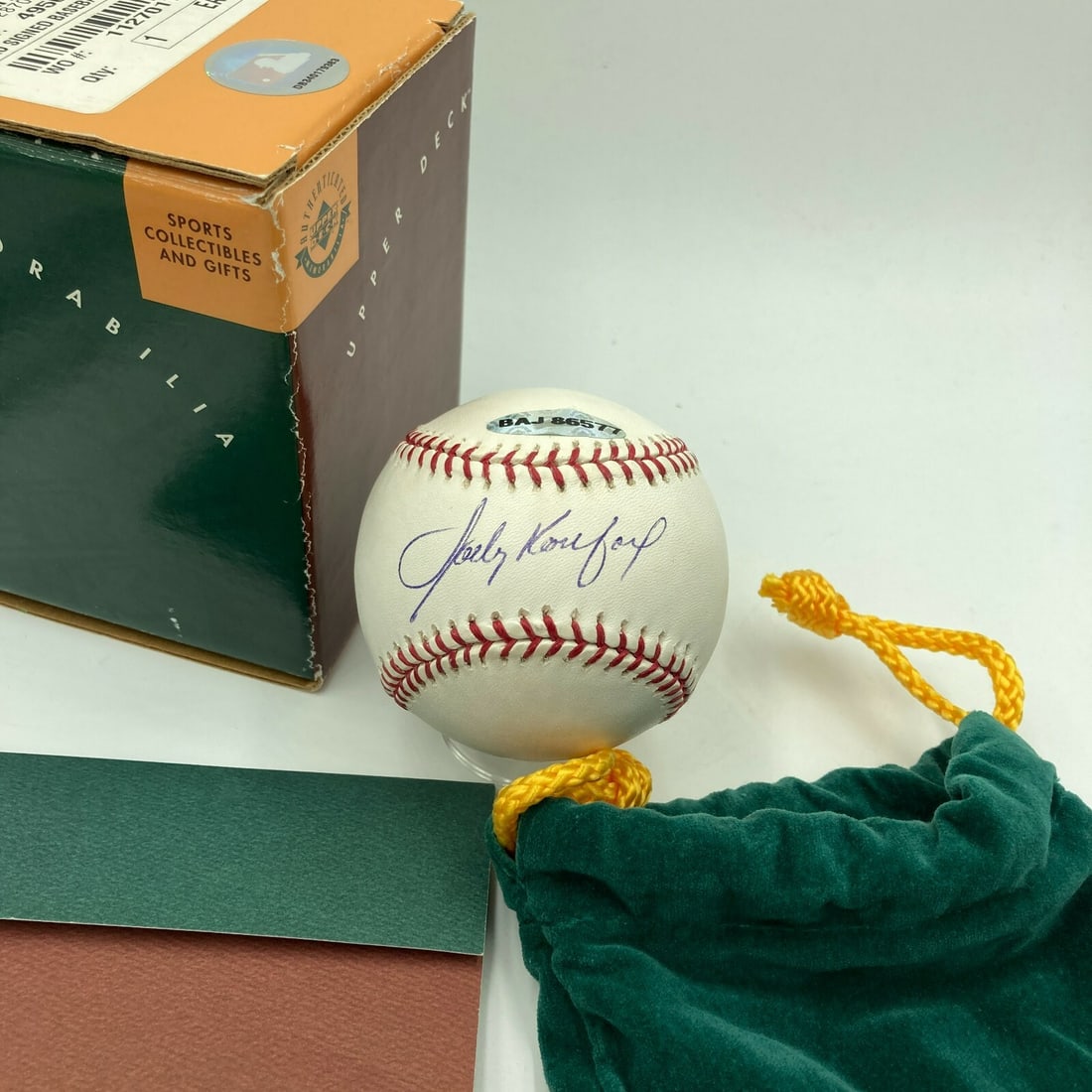 Sandy Koufax Autographed Major League Baseball with UDA COA: Sandy Koufax Autographed Major League Baseball with UDA COA This is an officially licensed Major League Baseball signed by baseball legend Sandy Koufax. This item comes with a UDA Upper Deck Authentic
