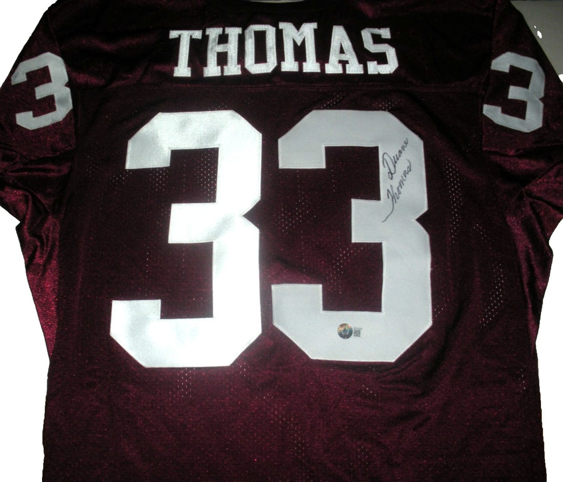 Duane Thomas Signed Rawlings Jersey with COA: Duane Thomas Signed Rawlings Jersey with COA This officially licensed Rawlings jersey, signed by Duane Thomas, is a must-have for any NFL football fan. Representing West Texas, this unique piece showc