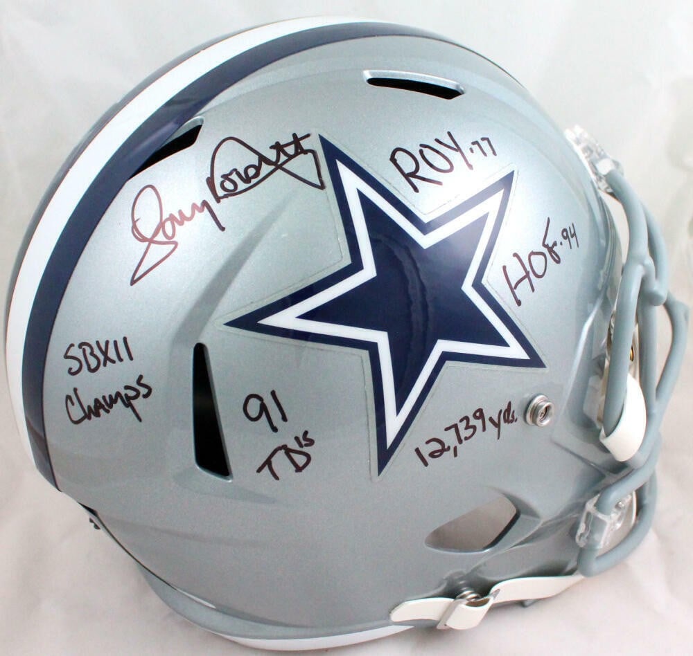 Tony Dorsett Autographed Dallas Cowboys Full Size Helmet JSA W 5 Inscriptions: Tony Dorsett Autographed Dallas Cowboys Full Size Helmet JSA W 5 Inscriptions This is an original full-size Speed helmet autographed by NFL legend Tony Dorsett, featuring five inscriptions. Dorsett, a