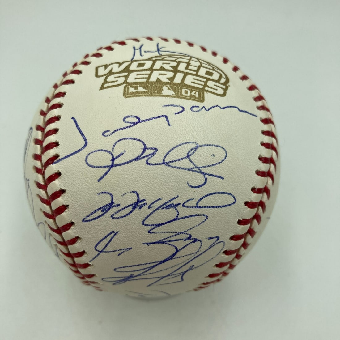2004 Boston Red Sox Team Signed Baseball with 22 Autographs JSA COA: 2004 Boston Red Sox Team Signed Baseball with 22 Autographs JSA COA Relive the historic moment of the 2004 Boston Red Sox World Series victory with this official Rawlings baseball. This team-signed ba
