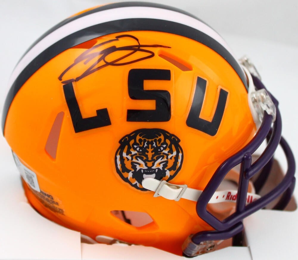 Odell Beckham Jr. Autographed LSU Tigers Mini Helmet with Beckett Hologram: Odell Beckham Jr. Autographed LSU Tigers Mini Helmet with Beckett Hologram This Odell Beckham Jr. autographed LSU Tigers speed mini helmet is a must-have for any football fan. It features the signatur