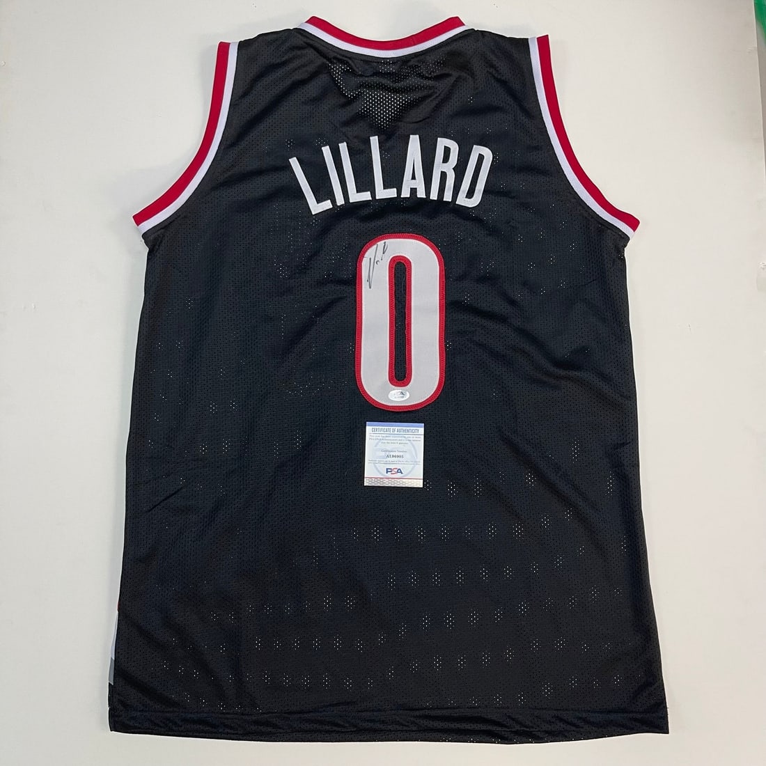 Damian Lillard Autographed Jersey PSA/DNA Portland Trail Blazers: Damian Lillard Autographed Jersey PSA/DNA Portland Trail Blazers This is an original stitched jersey autographed by Damian Lillard, the star player of the Portland Trail Blazers. The signature has bee