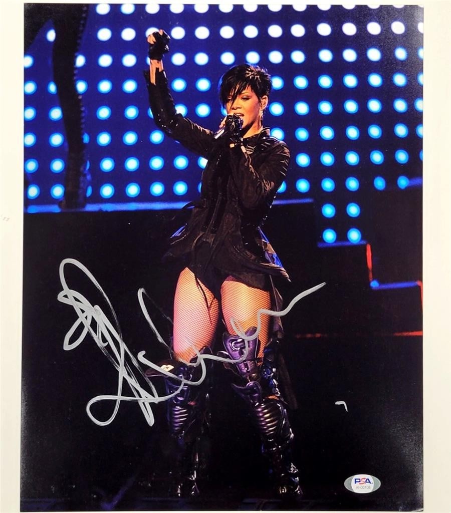 Rihanna Authentic Signed 11x14 Photo PSA/DNA Autograph: Rihanna Authentic Signed 11x14 Photo PSA/DNA Autograph This is an authentic signed photograph of the renowned singer Rihanna, measuring 11x14 inches. The autograph has been professionally authenticate
