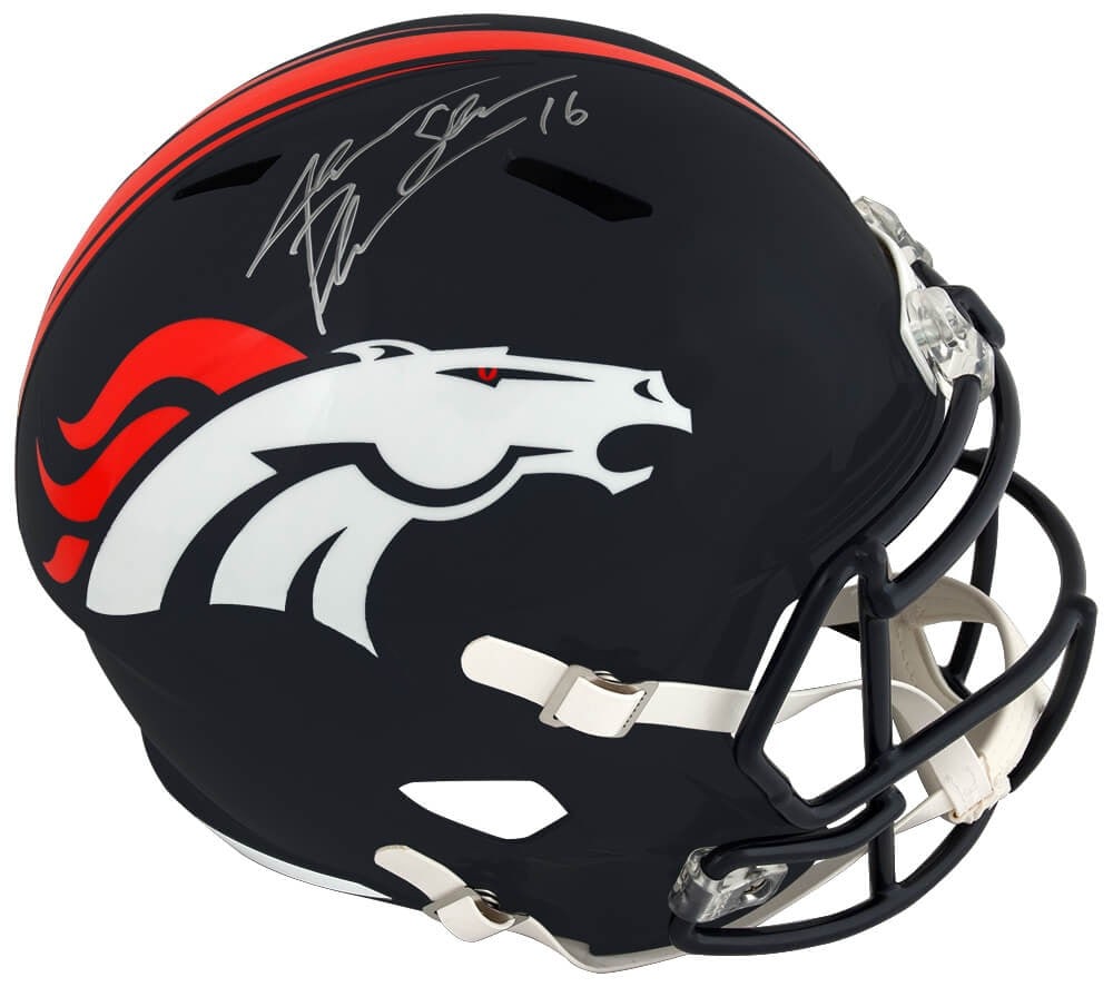 Jake Plummer Signed Broncos Riddell Speed Helmet with Snake Inscription: Jake Plummer Signed Broncos Riddell Speed Helmet with Snake Inscription This Denver Broncos Riddell full-size speed replica helmet is personally signed by former NFL quarterback Jake Plummer, featurin