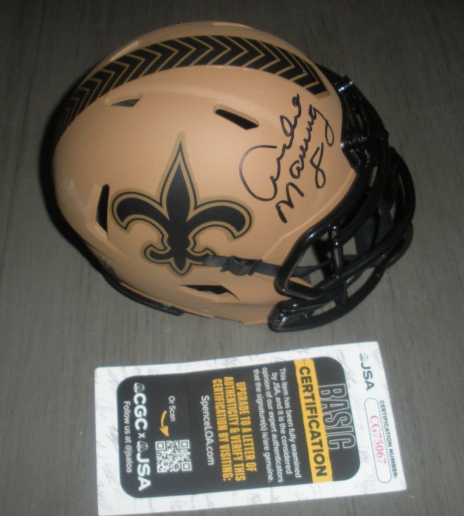 Archie Manning Signed Mini Helmet New Orleans Saints JSA COA: Archie Manning Signed Mini Helmet New Orleans Saints JSA COA This collectible mini helmet, signed by Archie Manning, is a tribute to the New Orleans Saints and their Salute to Service campaign. It fea