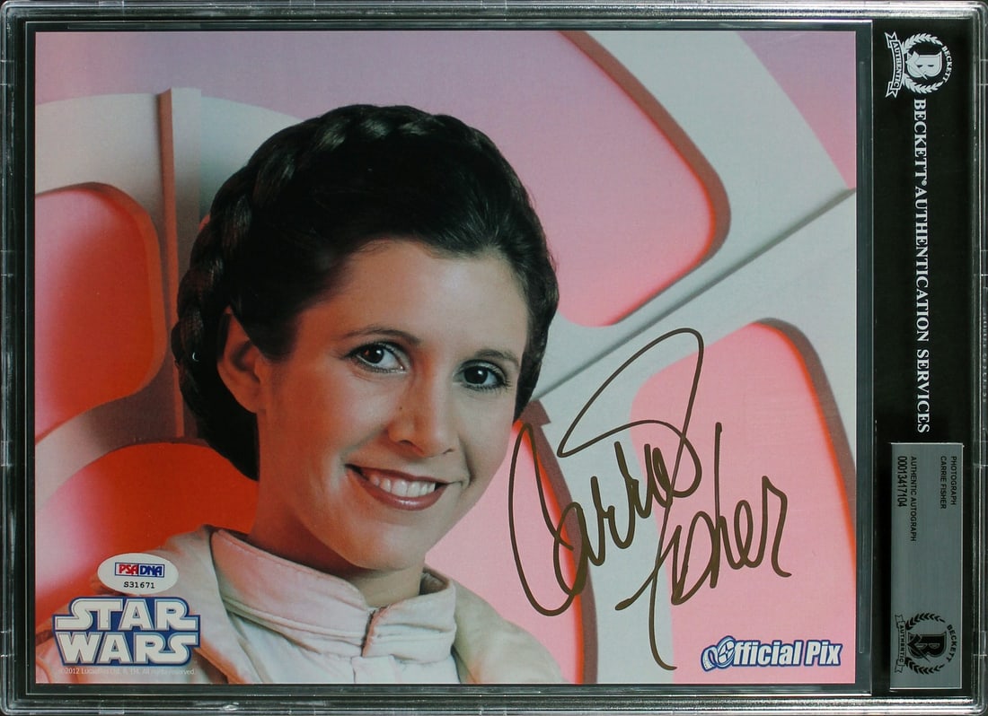 Carrie Fisher Signed Star Wars 8x10 Photo Gem Mint 10 Beckett Authenticated: Carrie Fisher Signed Star Wars 8x10 Photo Gem Mint 10 Beckett Authenticated This stunning 8x10 photograph features the iconic Carrie Fisher, personally signed and authenticated by Beckett Authenticati