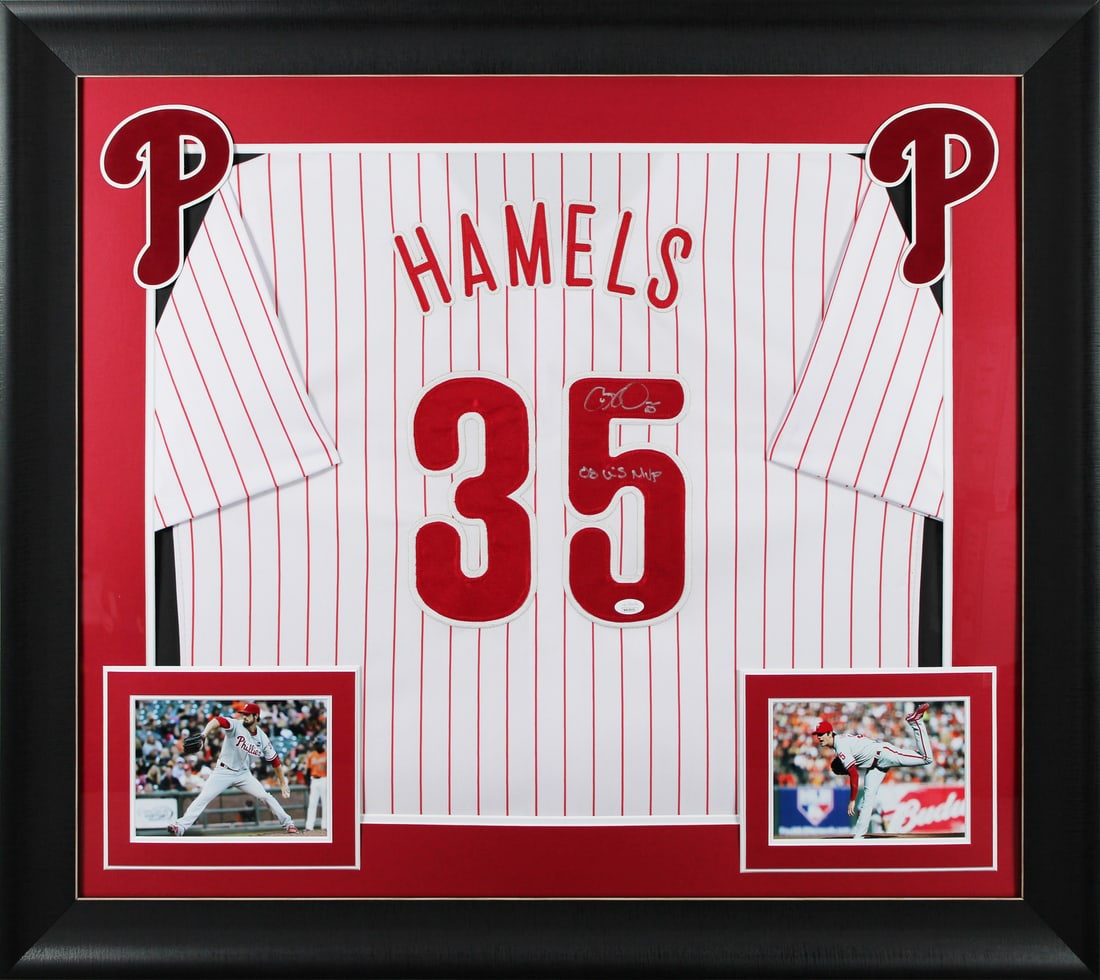 Cole Hamels Signed Framed Jersey 08 WS MVP JSA Authenticated: Cole Hamels Signed Framed Jersey 08 WS MVP JSA Authenticated Celebrate the legacy of Cole Hamels with this original signed white pinstripe pro-style jersey, framed and featuring the inscription "08 WS