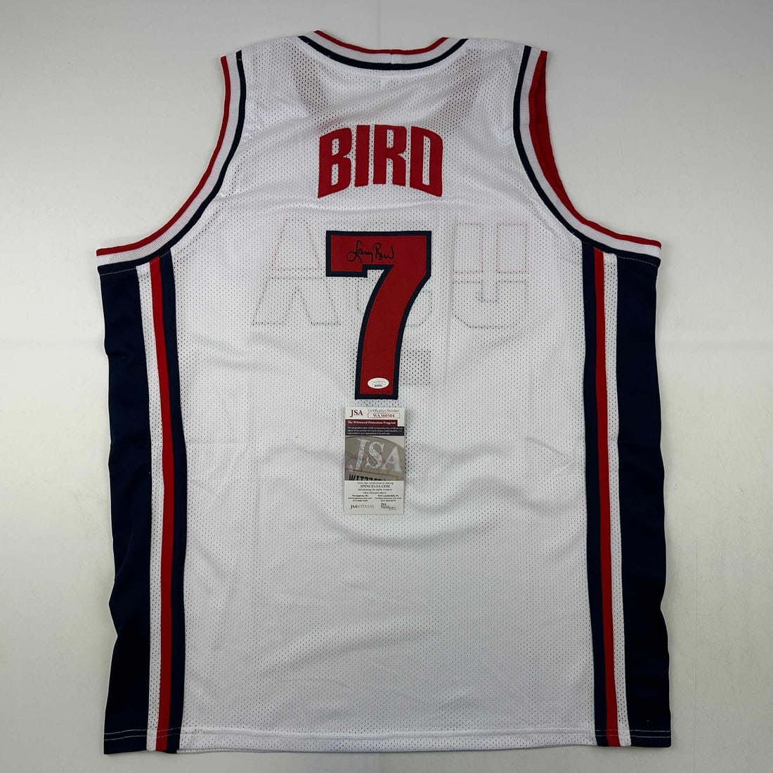 Autographed Larry Bird USA Dream Team Jersey JSA COA: Autographed Larry Bird USA Dream Team Jersey JSA COA Celebrate basketball history with this autographed Larry Bird United States White Dream Team Jersey, featuring his iconic name and number. This uni
