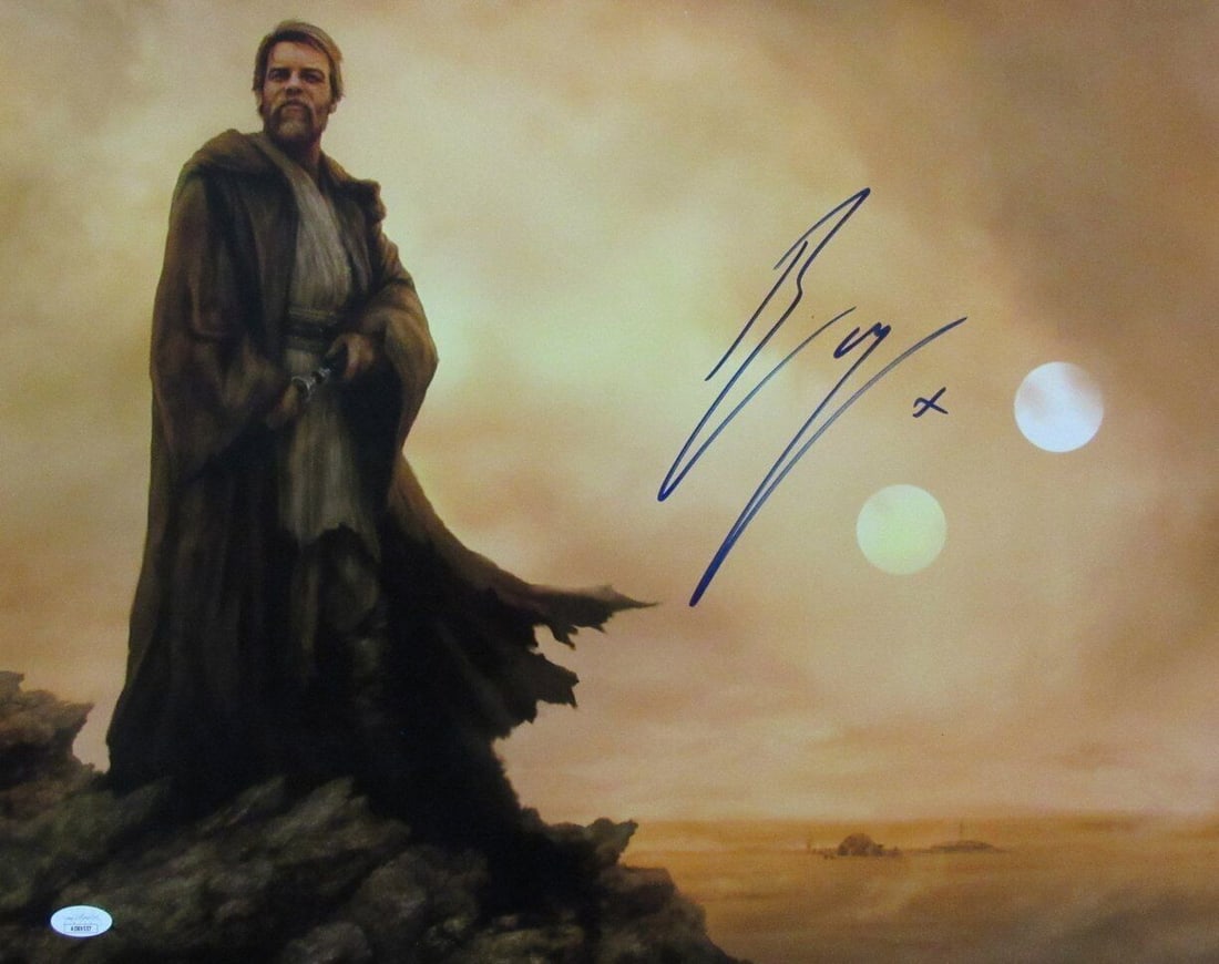 Ewan McGregor Signed 16x20 Obi-Wan Kenobi Photo with JSA Authentication: Ewan McGregor Signed 16x20 Obi-Wan Kenobi Photo with JSA Authentication This stunning 16x20 photo features Ewan McGregor as Obi-Wan Kenobi, beautifully autographed by the actor himself. The signature