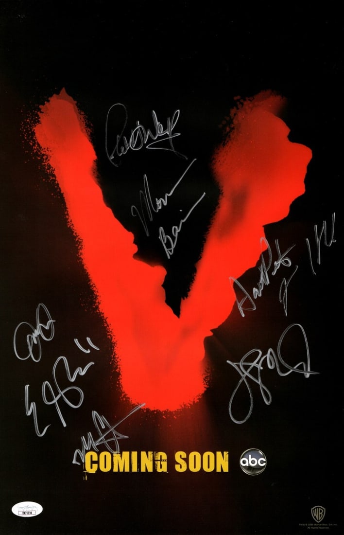 V Cast Autographed 11x17 Poster with 7 Signatures JSA Certified: V Cast Autographed 11x17 Poster with 7 Signatures JSA Certified This original 11x17 poster features autographs from the cast of the acclaimed series 'V', including Elizabeth Mitchell, Morena Baccarin,