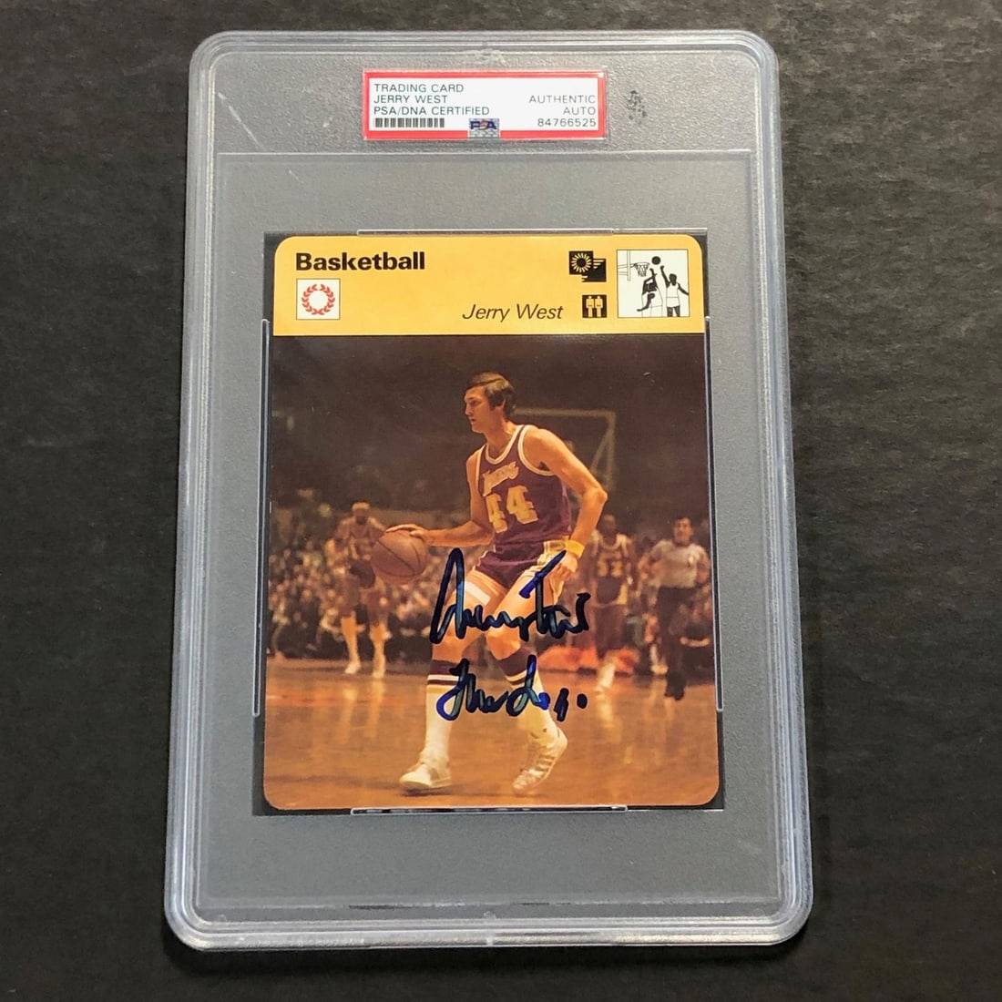 1977 Jerry West Signed Lakers Trading Card PSA/DNA Encapsulated: 1977 Jerry West Signed Lakers Trading Card PSA/DNA Encapsulated This 1977 edition trading card features the signature of Jerry West, a legendary player for the Los Angeles Lakers. The card is encapsul