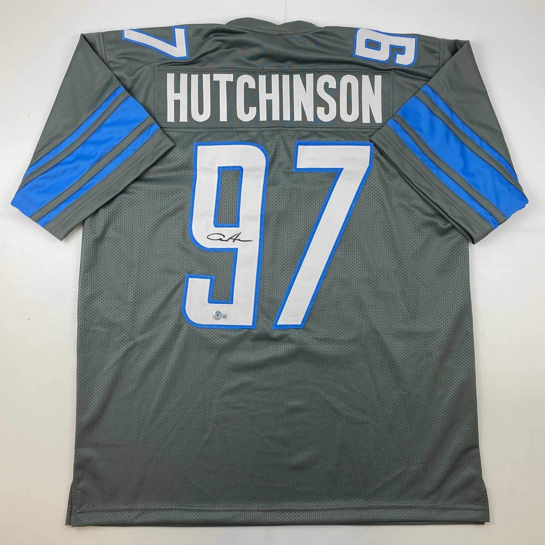 Aidan Hutchinson Signed Detroit Lions Grey Football Jersey Beckett COA: Aidan Hutchinson Signed Detroit Lions Grey Football Jersey Beckett COA This autographed Aidan Hutchinson Detroit Grey Football Jersey is a unique collectible for fans and collectors alike. It features