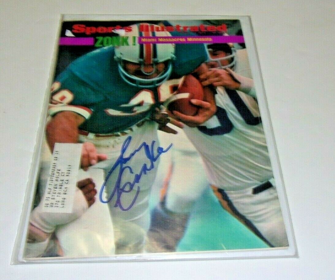 Larry Csonka Signed Sports Illustrated Magazine with COA: Larry Csonka Signed Sports Illustrated Magazine with COA This is an original Sports Illustrated magazine featuring Larry Csonka, the Hall of Fame running back for the Miami Dolphins. The magazine is p