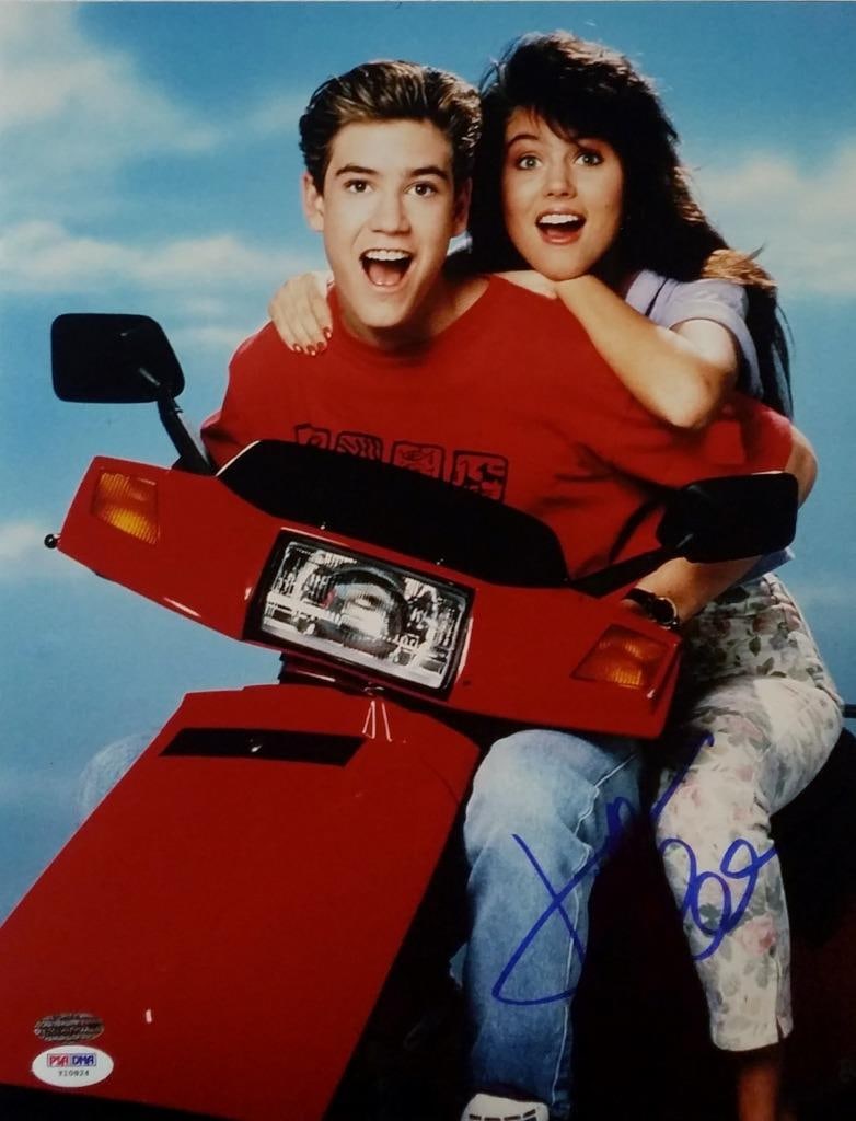 Tiffani Amber Thiessen Signed 11x14 Saved By The Bell Photo PSA/DNA: Tiffani Amber Thiessen Signed 11x14 Saved By The Bell Photo PSA/DNA Capture a piece of television history with this original 11x14 photo signed by Tiffani Amber Thiessen, famously known for her role i