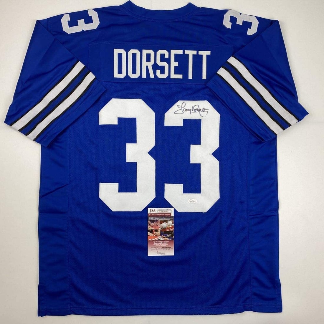 Tony Dorsett Signed Dallas Custom Retro Blue Jersey JSA Authenticated: Tony Dorsett Signed Dallas Custom Retro Blue Jersey JSA Authenticated This custom Dallas retro blue football jersey features the autograph of Tony Dorsett. The jersey is intended as an autographed col