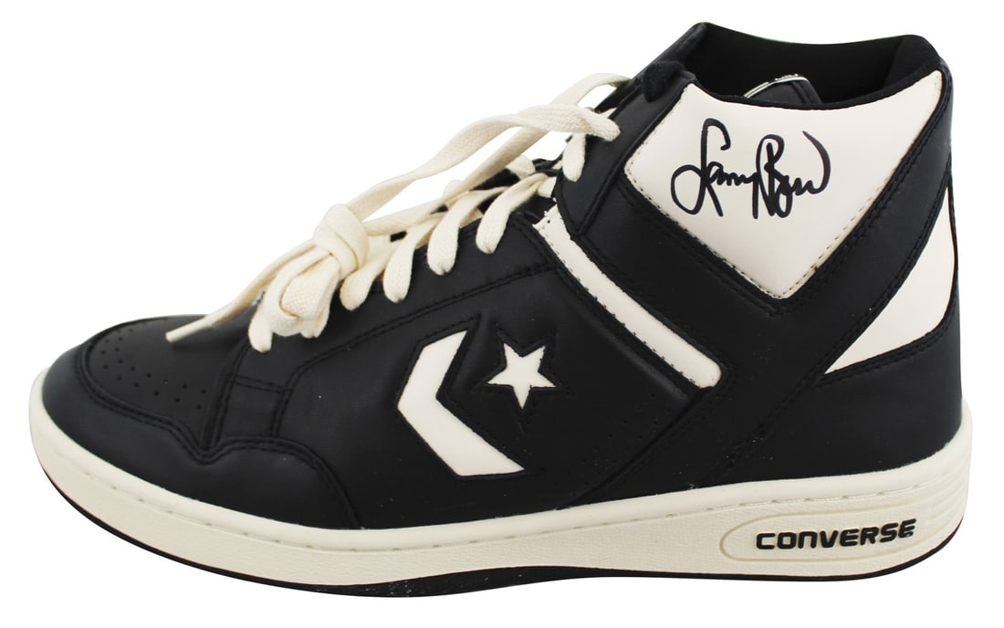 Larry Bird Autographed Left Converse Weapon Shoe BAS Witnessed Boston Celtics: Larry Bird Autographed Left Converse Weapon Shoe BAS Witnessed Boston Celtics Enhance your sports memorabilia collection with this authentic left black and white Converse Weapon shoe personally signed