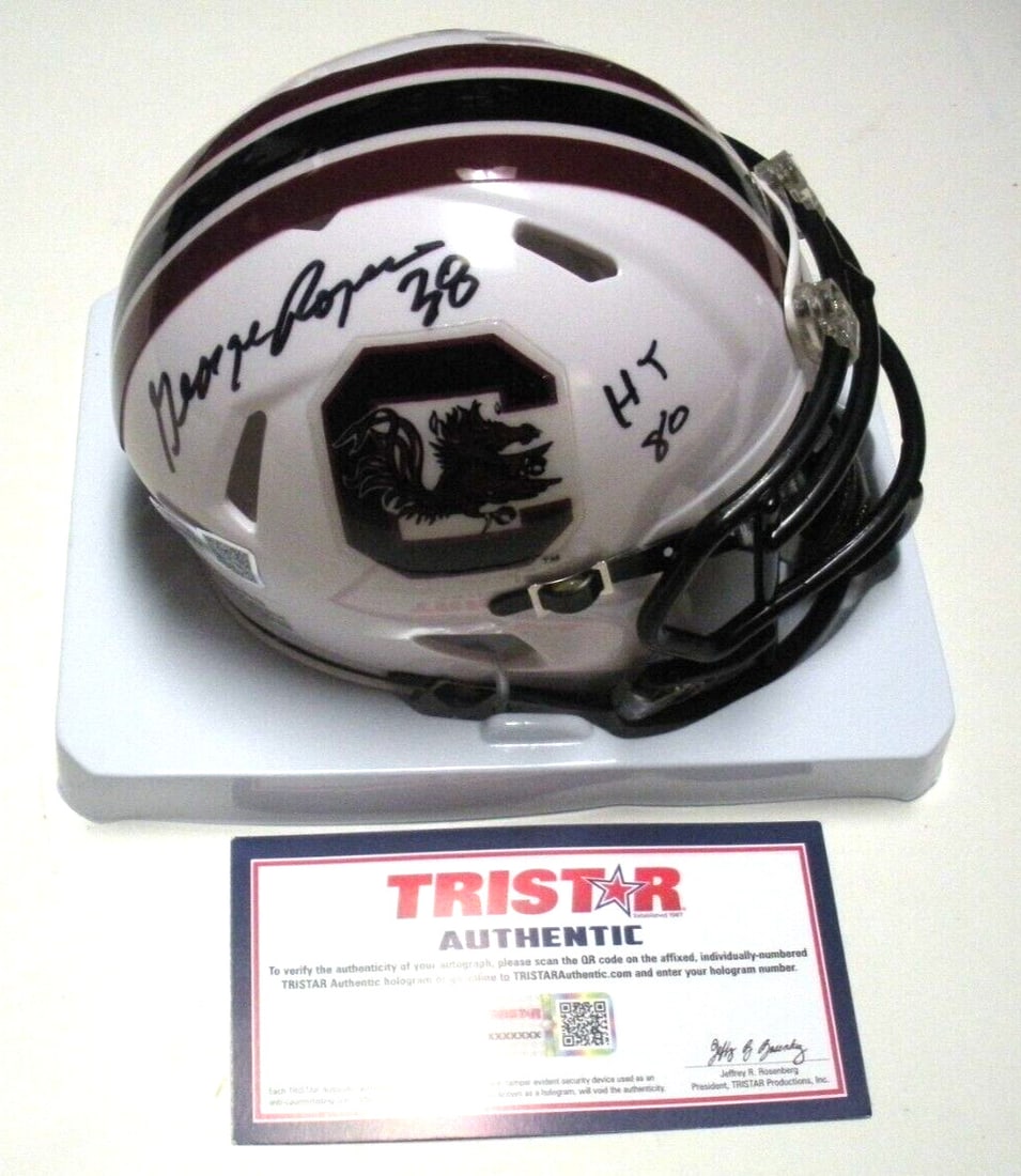 George Rogers South Carolina Gamecocks Signed Heisman Mini Helmet with COA: George Rogers South Carolina Gamecocks Signed Heisman Mini Helmet with COA This collectible mini helmet features the signature of George Rogers, the South Carolina Gamecocks Heisman Trophy winner. Per