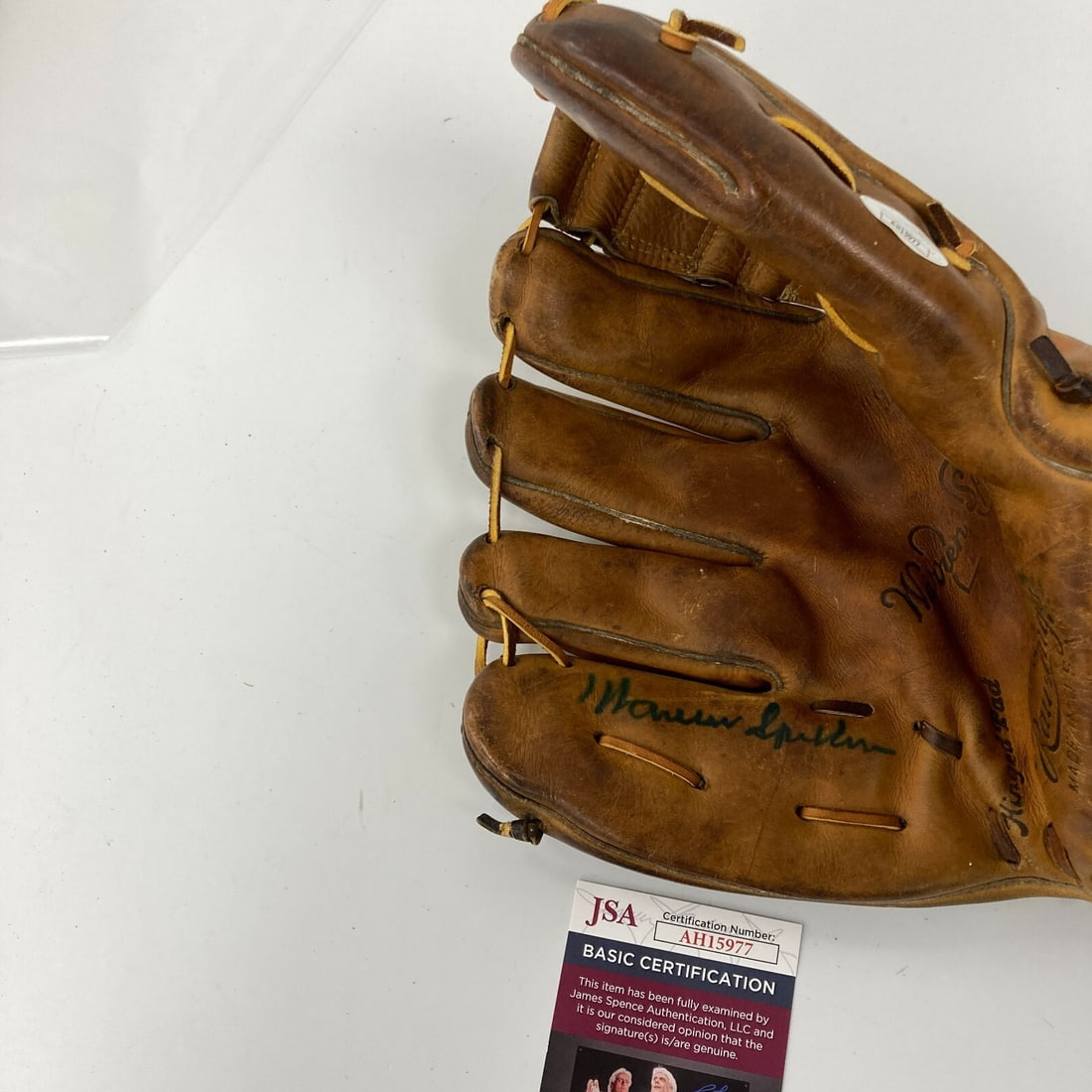 Warren Spahn 1950's Rawlings Signed Baseball Glove JSA COA: Warren Spahn 1950's Rawlings Signed Baseball Glove JSA COA This is a Warren Spahn signed 1950's Rawlings Game Model baseball glove, authenticated by James Spence Authentication (JSA). A true piece of