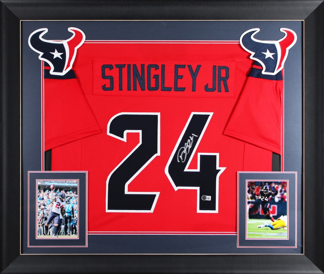 Framed Red Houston Texans Jersey Signed by Derek Stingley Jr BAS Witnessed: Framed Red Houston Texans Jersey Signed by Derek Stingley Jr BAS Witnessed This authentic red pro style jersey has been personally signed by Derek Stingley Jr. of the Houston Texans. The jersey is pro