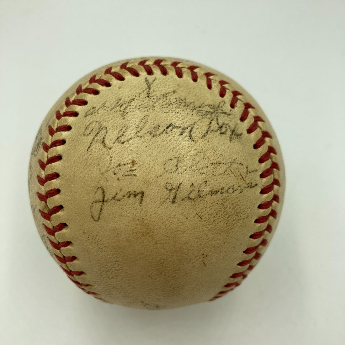 Nellie Fox 1945 Lancaster Red Roses Signed Baseball JSA COA: Nellie Fox 1945 Lancaster Red Roses Signed Baseball JSA COA This is an original 1945 Lancaster Red Roses Minor League baseball signed by Nellie Fox, a pre-rookie player. The ball features multiple tea