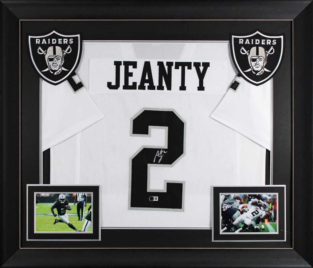 Ashton Jeanty Signed White Framed Jersey Las Vegas Raiders BAS Authenticated: Ashton Jeanty Signed White Framed Jersey Las Vegas Raiders BAS Authenticated This authentic white pro style framed jersey, personally signed by Ashton Jeanty of the Las Vegas Raiders, is a must-have f
