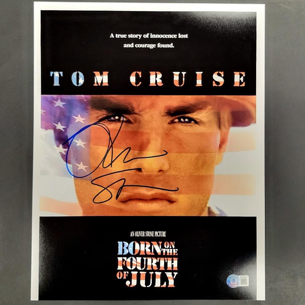 Oliver Stone Autographed 11x14 Born on the Fourth Photo Beckett Certified: Oliver Stone Autographed 11x14 Born on the Fourth Photo Beckett Certified This striking 11x14 photograph poster features the iconic film 'Born on the Fourth of July,' directed by Oliver Stone. The pos