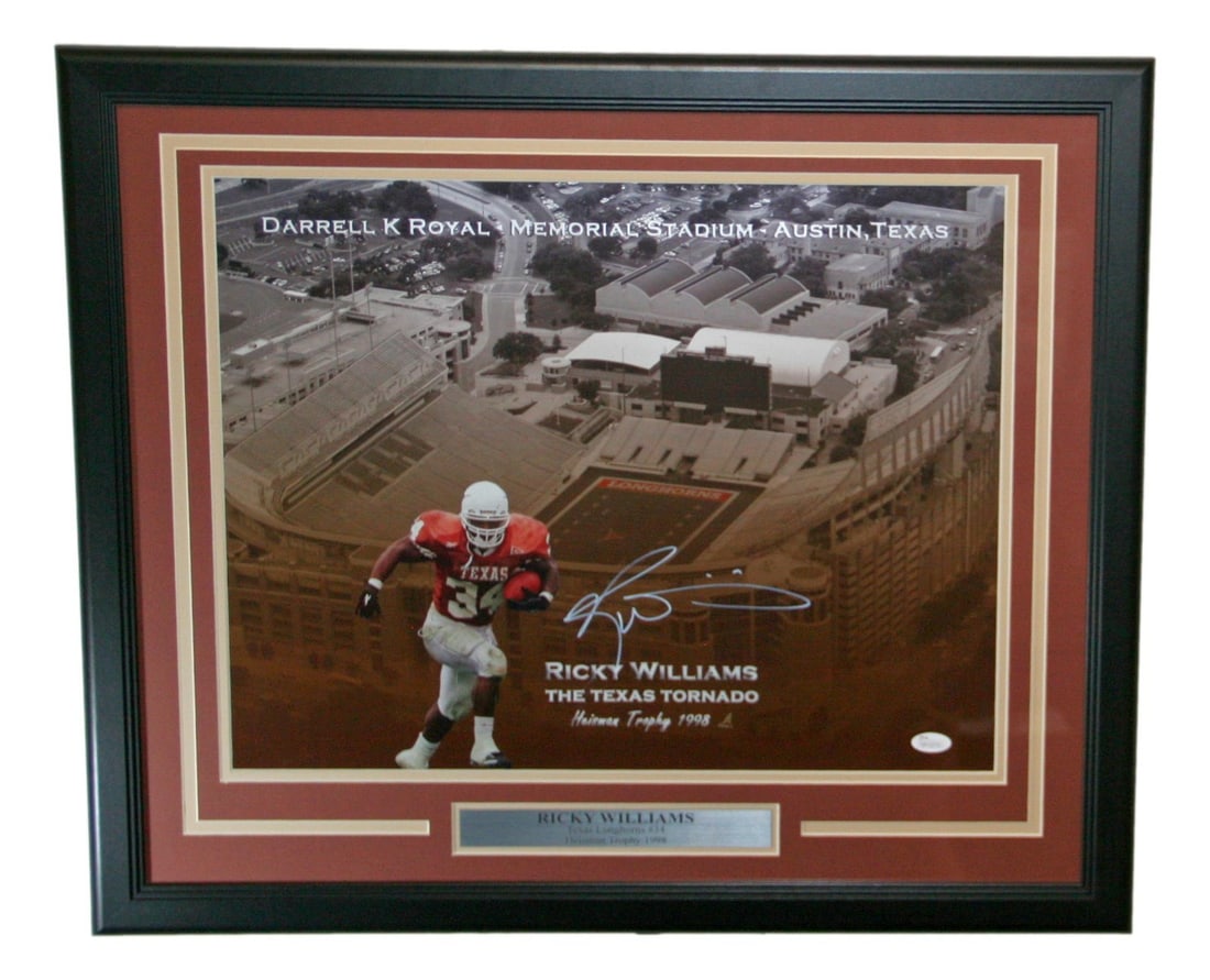 Ricky Williams Autographed Texas Longhorns 16x20 Photo JSA Certified: Ricky Williams Autographed Texas Longhorns 16x20 Photo JSA Certified This striking 16x20 photo features the legendary Ricky Williams, a celebrated player of the Texas Longhorns. The photo is beautiful