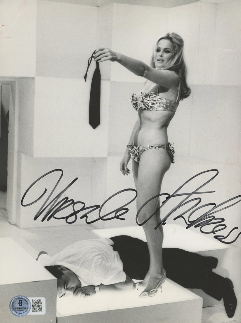 Ursula Andress Signed 7x9.5 Photo The 10th Victim BAS Authenticated: Ursula Andress Signed 7x9.5 Photo The 10th Victim BAS Authenticated This is an authentic 7x9.5 photograph personally signed by Ursula Andress, renowned for her role in 'The 10th Victim.' The photo com