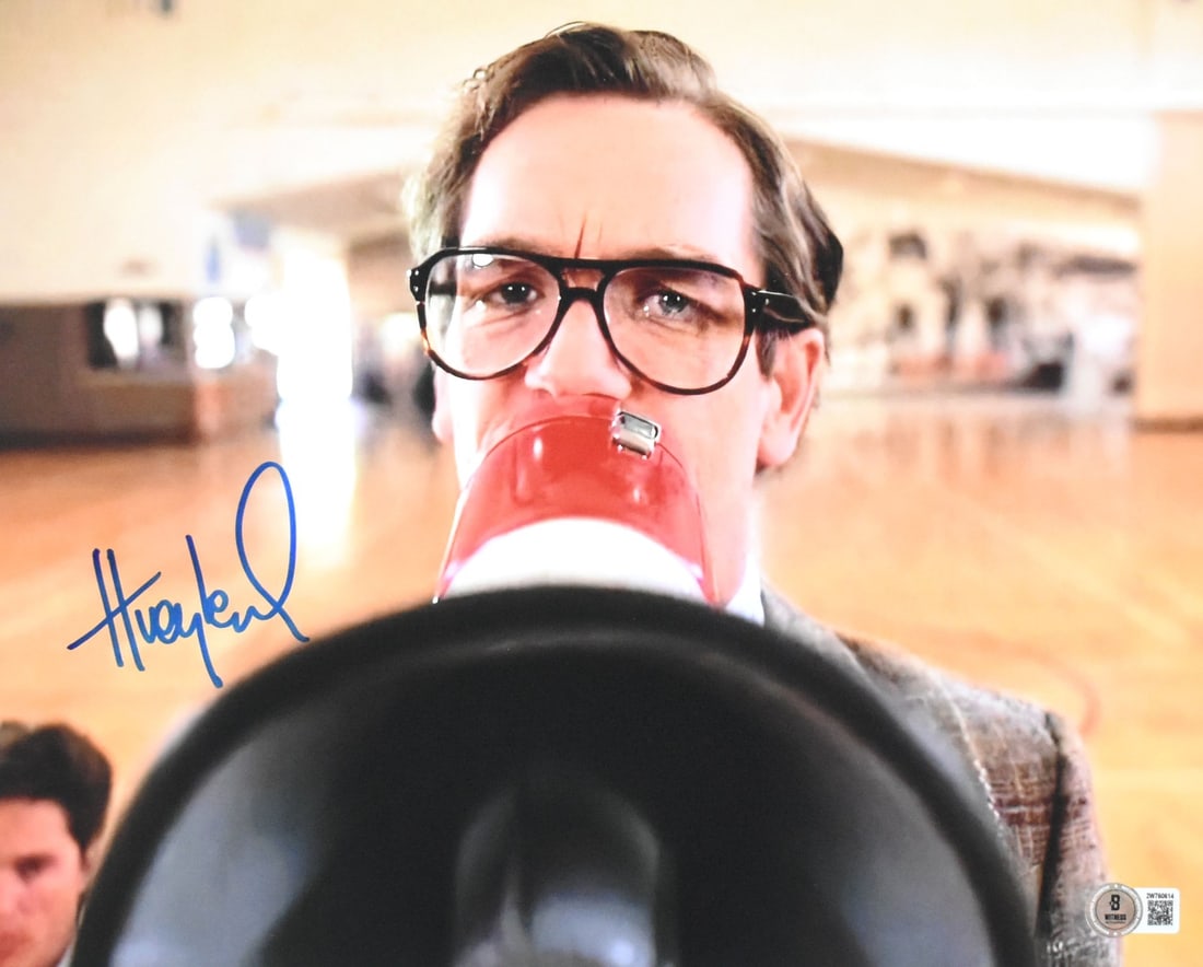 Huey Lewis Signed 11x14 Back to the Future Photo Beckett Hologram: Huey Lewis Signed 11x14 Back to the Future Photo Beckett Hologram This is an authentic 11x14 inch photo from the iconic movie 'Back to the Future', personally autographed by Huey Lewis. The photograph