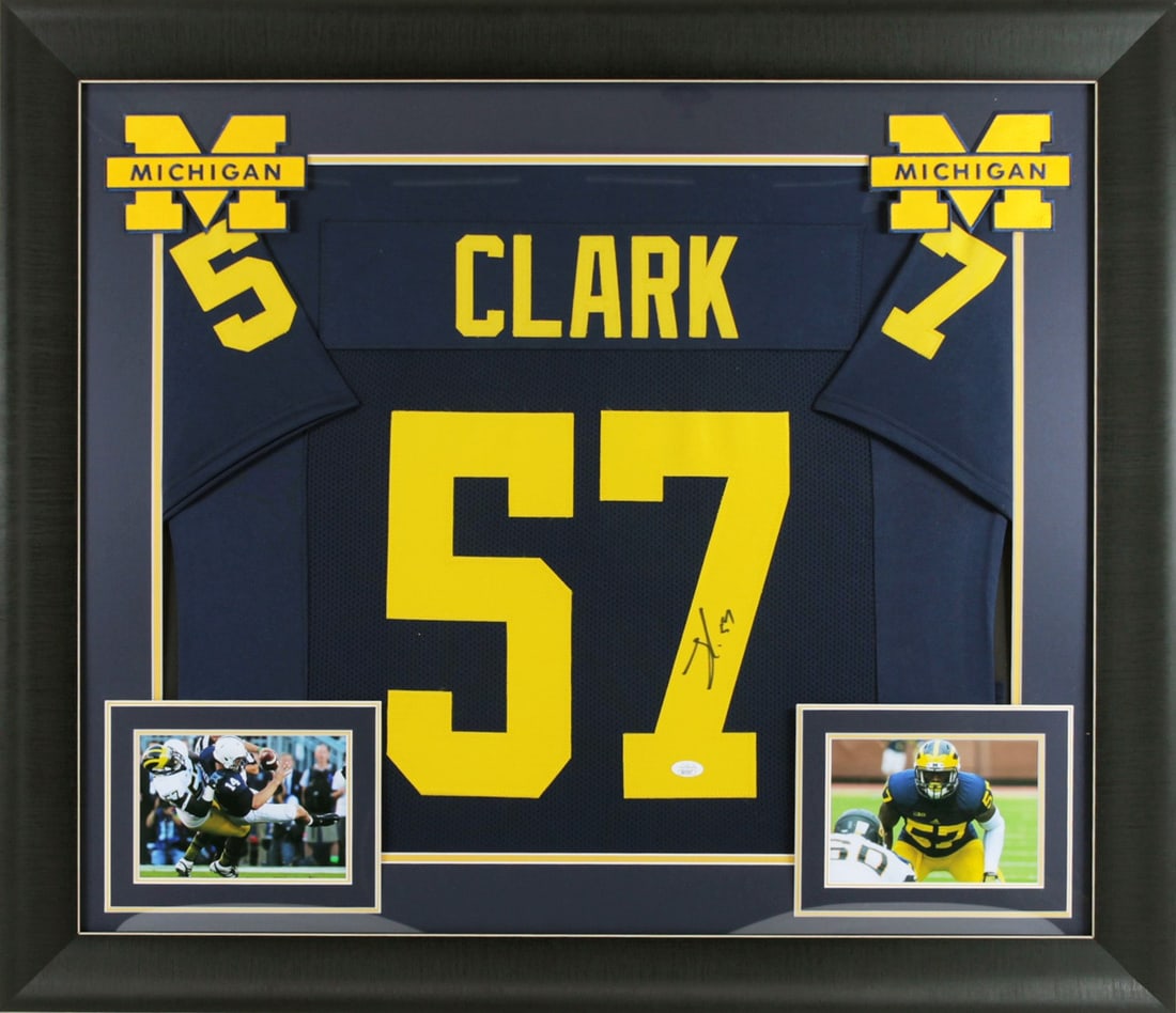 Frank Clark Signed Michigan Wolverines Navy Blue Framed Jersey JSA COA: Frank Clark Signed Michigan Wolverines Navy Blue Framed Jersey JSA COA Celebrate your passion for football with this authentic signed navy blue pro style framed jersey featuring Frank Clark of the Mic