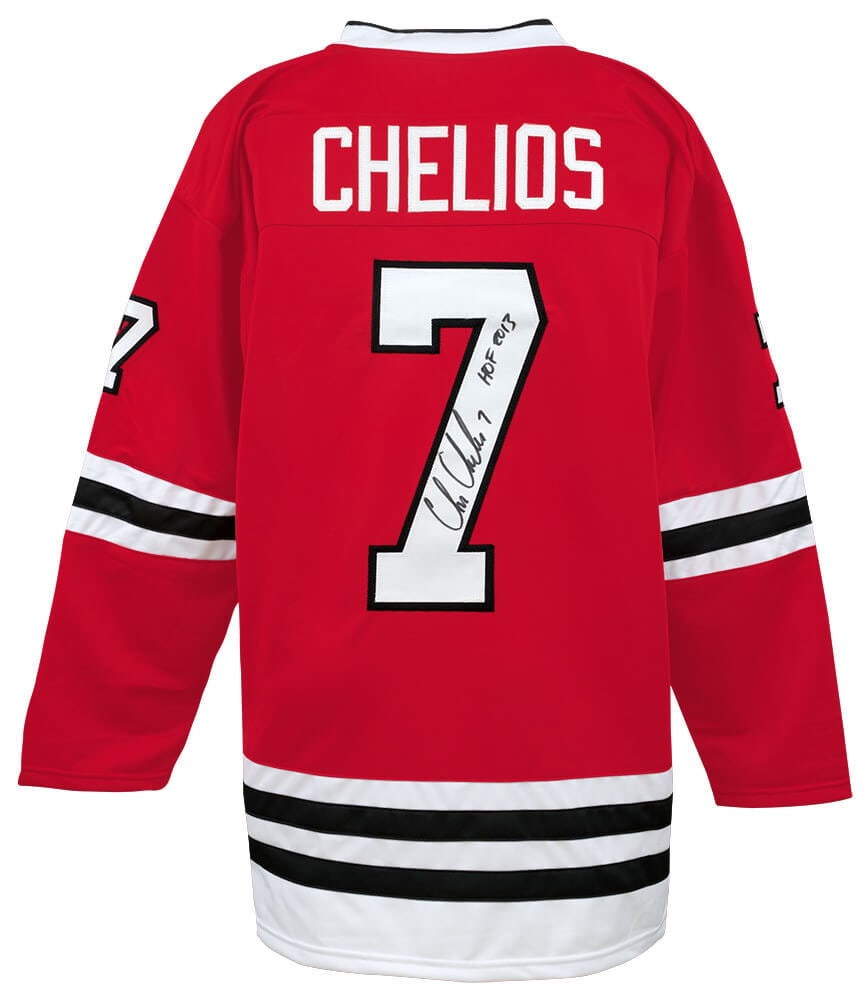 Chris Chelios Signed Red Custom Hockey Jersey HOF 2013 Blackhawks: Chris Chelios Signed Red Custom Hockey Jersey HOF 2013 Blackhawks This is a signed red custom hockey jersey by Chris Chelios, featuring an inscription of 'HOF 2013'. The jersey is from the Chicago