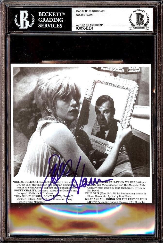 Goldie Hawn Autographed Magazine Photo 6 x 9 Beckett Authenticated: Goldie Hawn Autographed Magazine Photo 6 x 9 Beckett Authenticated This Goldie Hawn signed autographed magazine photo features the iconic actress in a captivating pose from the film 'Cactus Flower.' T