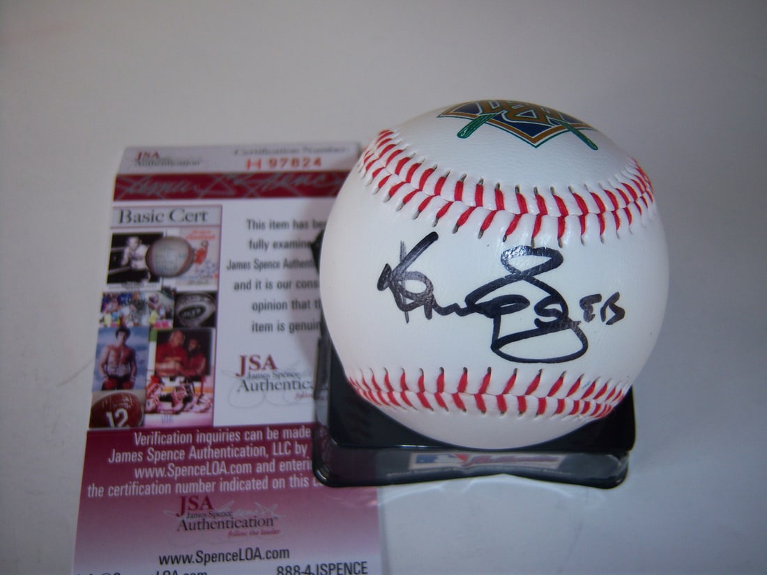 Kenny Rogers Signed Baseball with JSA Authentication: Kenny Rogers Signed Baseball with JSA Authentication This is an original signed baseball by the legendary country music singer Kenny Rogers, who is remembered as a great artist in the music industry.