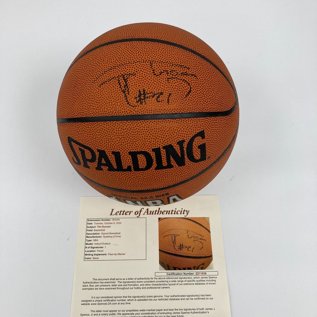 Tim Duncan Autographed Spalding Basketball with JSA COA: Tim Duncan Autographed Spalding Basketball with JSA COA This is an original Spalding NBA Basketball signed by the legendary Tim Duncan, a prominent player of the San Antonio Spurs. The basketball come